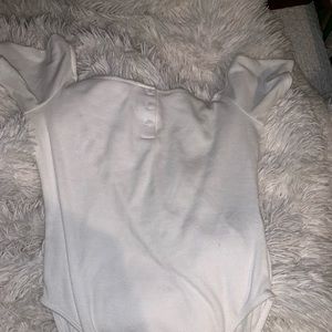 White body suit lightly worn